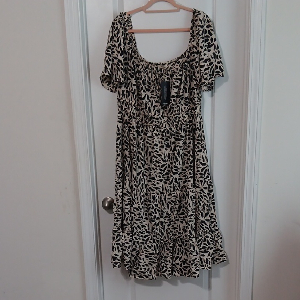 Chic Black and Cream Midi Dress